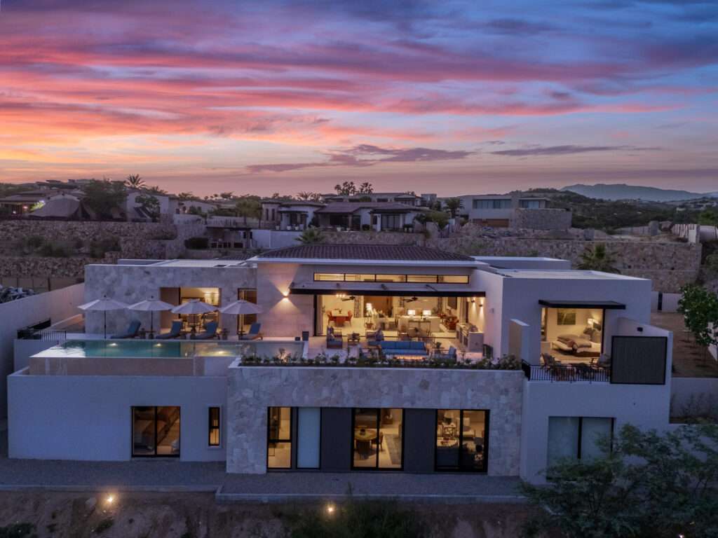 Querencia Section 18- Horizontes Welcome to Horizontes 3, an exquisite custom-made home located within San José del Cabo's most sought-after community, Querencia. Surrounded by Tom Fazio's signature golf course, recognized as one of the best in the country, this stunning residence is just a short golf cart ride from the prestigious 5-star Club House. This remarkable 6-bedroom, 6.5-bathroom home elevates luxury living with a fresh vision of architecture and design. The layout features a cozy family room, an expansive bunk bed bedroom on the lower level, and a spacious maid's quarters with an independent entrance, making it ideal for entertaining family and friends.The property boasts outdoor living spaces, including tranquil green areas, an outdoor kitchen, an infinity pool, a jacuzzi, and ocean and ravine – 3 Querencia, San Jose Corridor, BS